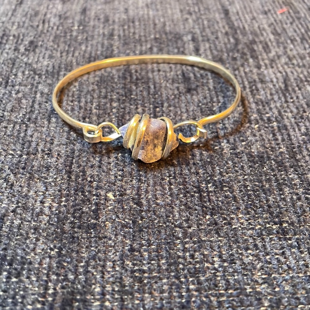 Silver bracelet with blue stone